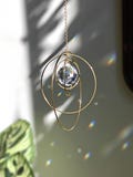 Crystal suncatcher GALAXY : Minimalist rainbow maker | Brass window hanging | Light catcher decor | New home gift | Handmade in France product logo