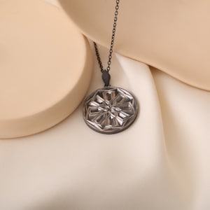 Handmade silver Daisy Medallion, engraved