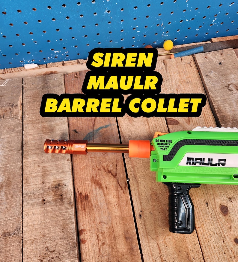 May include: A green and black toy blaster with a gold barrel and orange accents. The text "SIREN MAULR BARREL COLLET" is displayed on the image. The blaster has a black handle and the text "MAULR" is visible.