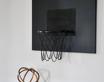 Aro de baloncesto de cuero negro: decoración deportiva para montaje en pared.