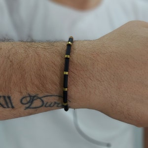 Gold and hematite bracelet