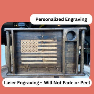 May include: A dark stained wooden serving tray with an engraved American flag design. The tray includes a circular cutout and a rectangular compartment. Text on the image reads "Personalized Engraving" and "Laser Engraving - Will Not Fade or Peel."