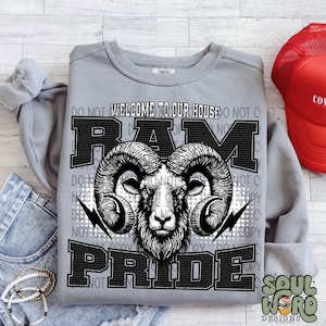 May include: Gray sweatshirt with a black and white graphic of a ram's head with the text "Welcome to our house RAM PRIDE" printed on it.