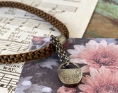 Lovely Antique Victorian Hair Bracelet with sentimental floral engraved locket charm containing a lock of hair