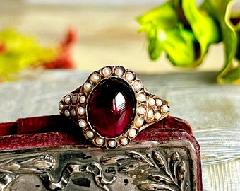 Antique Victorian cabochon garnet and split seed pearls ring