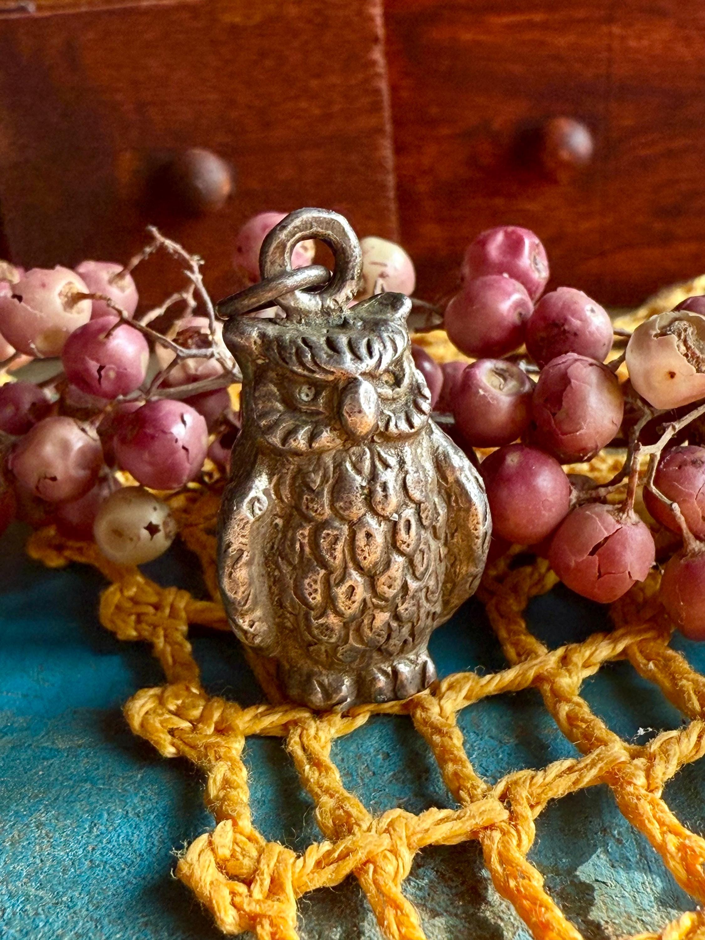 Antique owl charm