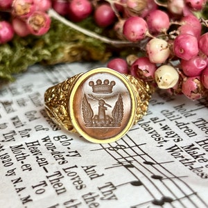 Vintage citrine intaglio signet ring with crest and floral chased band
