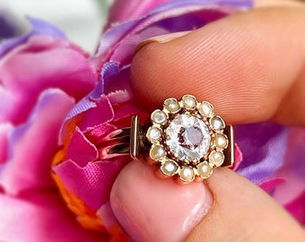 End of 19th century paste and split pearl seeds daisy ring
