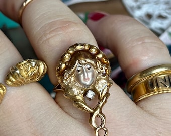 Antique Art nouveau enamel ring representing a woman dancer and a diamond