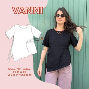 May include: A black short-sleeved top with a round neckline and an asymmetrical hemline featuring a side drawstring detail. The image includes a technical line drawing labelled VANNI, with sizing information for US 2 to 14, UK 6 to 18, and FR 34 to 58.