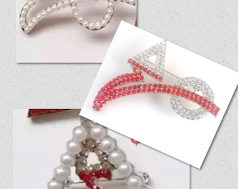 DST BROOCHES