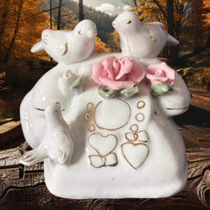Vintage  Bird Figurines on Telephone