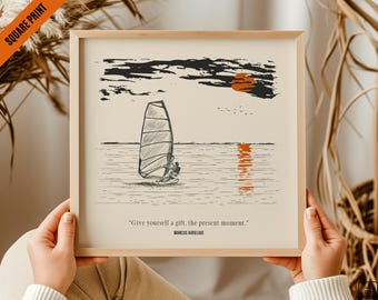 May include: A black and white illustration of a person windsurfing on a body of water with a red sun setting in the background. The quote "Give yourself a gift, the present moment." by Marcus Aurelius is printed below the illustration.