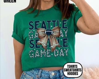 Ropa unisex de Seattle Football: camisetas, sudaderas de cuello redondo y sudaderas con capucha, regalo para fanáticos del deporte, atuendo para el día del partido, lazo de leopardo.