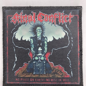 May include: Black and red embroidered patch with the text "Final Conflict" in red. A figure with spiky hair is standing in front of a mushroom cloud. The text "No peace on earth - no rest in hell" is at the bottom of the patch.