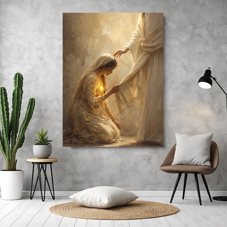 May include: A vertical wall art print depicting a kneeling figure in a long, light-colored robe reaching out to touch the hem of a standing figure draped in flowing white fabric. The scene is illuminated by a warm, golden glow emanating from the center.