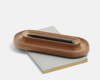 Desk Tray "POLEGAR" is a monolithic figure that will add an artistic dimension to your desk.