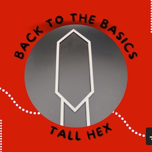 May include: A black and white graphic with the text "Back to the Basics" in a circle with a white tall hexagonal shape in the center. The text "Tall Hex" is below the circle.
