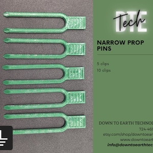 May include: Green plastic narrow prop pins for model airplanes.  5 clips for $2.50, 10 clips for $4.00.  Down to Earth Technologies, 724-469-0886, etsy.com/shop/downtoearthtech, www.downtoearth.tech, info@downtoearthtech.com