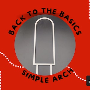 May include: A white metal arch with the text "Back to the Basics Simple Arch" in black lettering on a gray background.