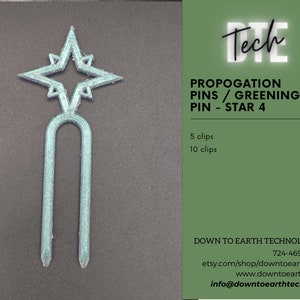 May include: A teal blue 3D printed propagation pin shaped like a star with a U-shaped base. The pin is designed to help with plant propagation. The text "PROPOGATION PINS/GREENING PIN - STAR 4" is printed on a green background. The text "DOWN TO EARTH TECHNOLOGIES" is printed below the price list.