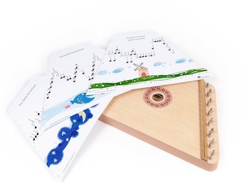 Zither. Wooden plucked string instrument.