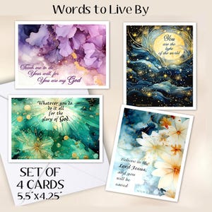 May include: A set of four rectangular greeting cards measuring 5.5 inches by 4.25 inches, each featuring unique abstract watercolor designs and religious text. The cards display floral patterns, celestial motifs, and scriptural quotes.