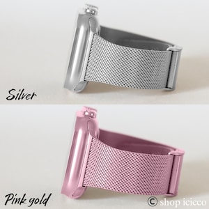 K&ouml;nnte beinhalten: Nahaufnahme von zwei Smartwatch-Armb&auml;ndern. Eines ist silberfarben mit einem passenden Mesh-Armband, das andere ist ros&eacute;goldfarben mit einem passenden Mesh-Armband. Das Wort "Silver" ist in schwarzer Schreibschrift &uuml;ber der silbernen Uhr geschrieben. Die Worte "Pink gold" sind darunter geschrieben.