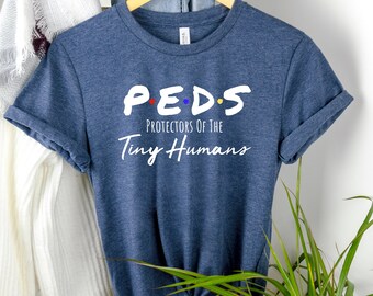 Peds Protectors Of The Tiny Humans | Pediatrics | RN | Tech | MD | Occupational Physical Speech Therapy | Peds Shirt | Kids | Great Gift!