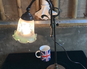 Art Deco brass adjustable swan neck table lamp with frosted and etched tulip glass shade.