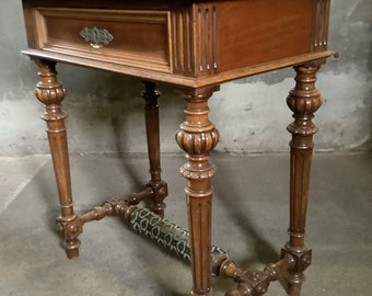 19th c antique mahogany sewing table with fold out velvet top.