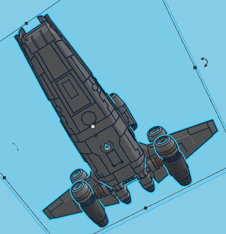 May include: A gray and black spaceship with a long, narrow body and two large engines on the back. The spaceship has a small, round window on the side.