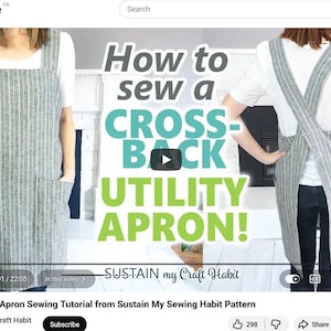 May include: A grey and white pinstriped utility apron with a cross-back design and two large front pockets. The apron is shown from the front and back, featuring text that reads How to sew a CROSS-BACK UTILITY APRON! and SUSTAIN my Craft Habit.