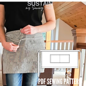 May include: A waist apron featuring a black and white vertical pinstripe pattern with a tie waist. An overlaid white line drawing illustrates the apron's construction, including a central double pocket. Text reads SUSTAIN my Sewing Habit.