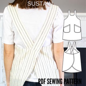 Può includere: Un grembiule color bianco sporco con sottili righe verticali nere, caratterizzato da un design con schiena incrociata e tasche laterali. L'immagine include un disegno tecnico del grembiule visto davanti e dietro, con il testo "SUSTAIN my Sewing Habit" e "PDF SEWING PATTERN".