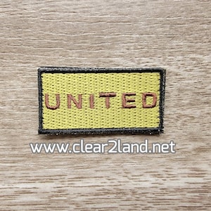 United Airlines Flight Suit Pencil Tab Patch   (2 inch by 1 inch with velcro back)