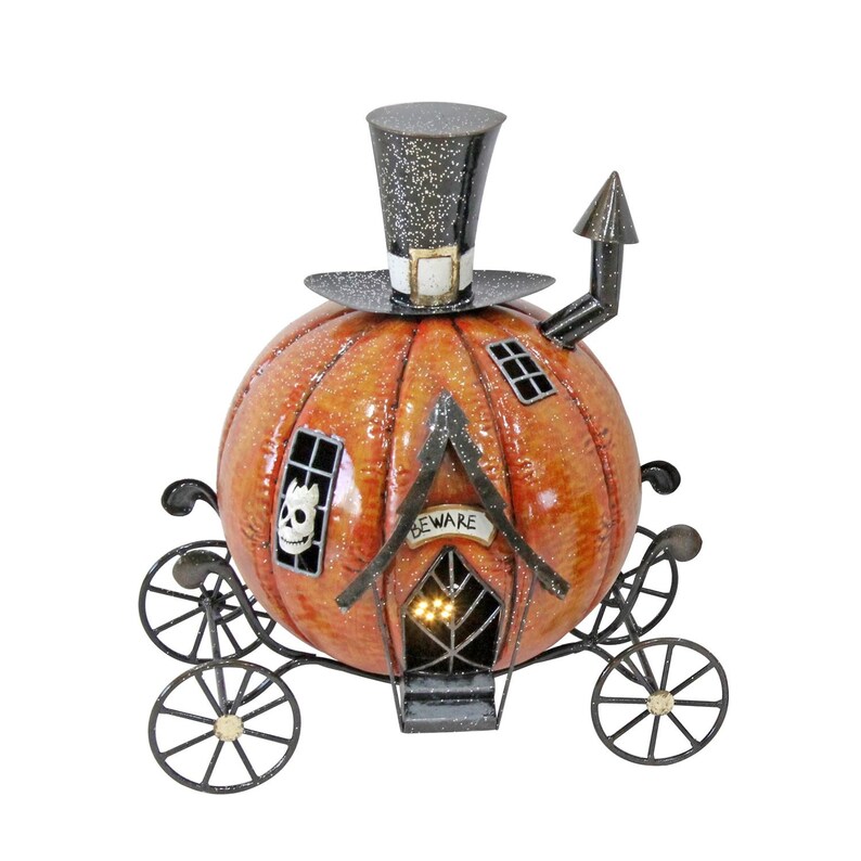 May include: Orange pumpkin carriage decoration with a black top hat and wheels. The carriage has a "BEWARE" sign above the door and a skull in the window. A decorative Halloween item.