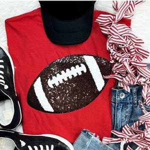 Maglietta colorata con toppa da football in paillettes