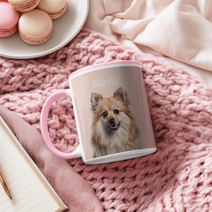 May include: A set of three ceramic mugs with a speckled, matte finish. The mugs are in shades of cream, light gray, and dark gray. Each mug has a simple, minimalist design and a rounded handle.