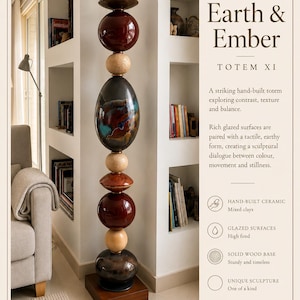 May include: A tall, vertical ceramic totem sculpture titled Earth & Ember Totem XI, standing 156 cm high. It features stacked, rounded, and spherical elements in glossy dark brown, red, and textured beige finishes, mounted on a solid wood base.
