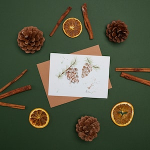 Carte de voeux: Pommes de pin