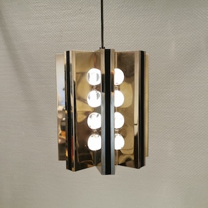 Unique hanging lamp, Danish from the 80s, in shiny metal (chrome) with mirror reflection.