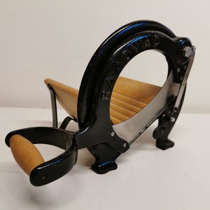Bread slicer from Danish Royal Raadvad in great condition. Original black color and very well maintained.