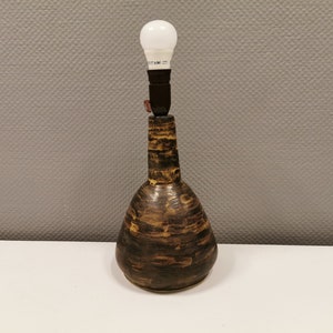 Beautiful table lamp in ceramic, Danish and from the 1960s-1970s.