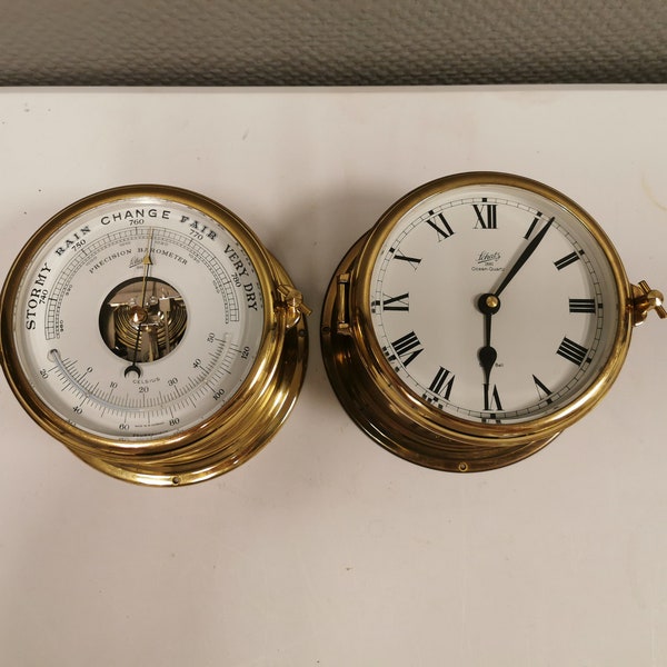 VERY beautiful and rare set, consisting of a Schatz ship's clock and barometer (incl. thermometer with both Celcius and Fahrenheit).