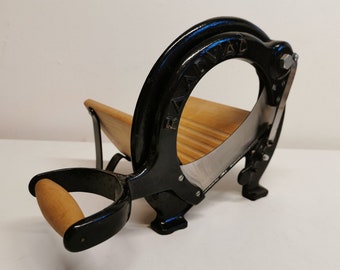 Bread slicer from Danish Royal Raadvad in great condition. Original black color and very well maintained.