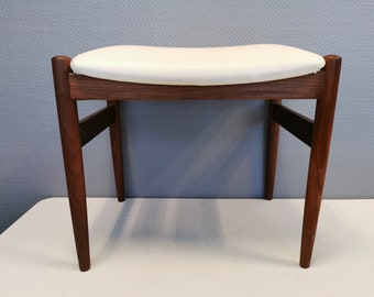 Beautiful stool from the 1960s-1970s, produced by Spøttrup Denmark.  It is made of teak wood with white imitation leather