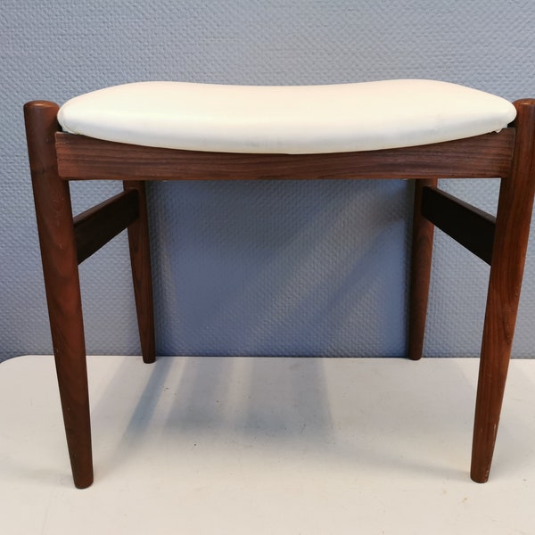 Beautiful stool from the 1960s-1970s, produced by Spøttrup Denmark.  It is made of teak wood with white imitation leather