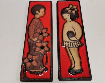 Large/long Søholm relief in beautiful red glaze with a motif of a girl and a boy.