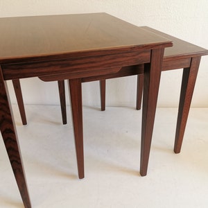 Set of two mid-century rosewood nesting tables designed by Bent Silberg for Furniture of Denmark. Danish, retro, vintage, design